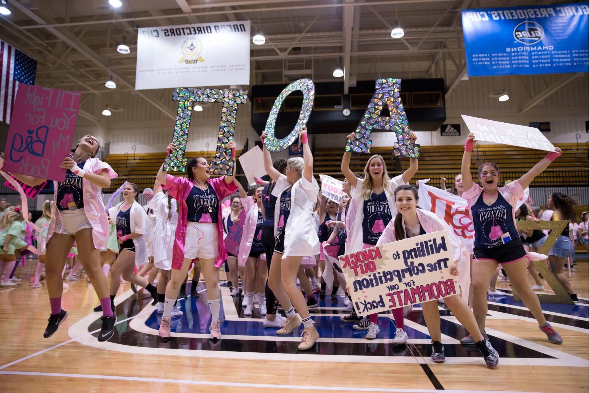 Sorority at Bid Night excitedly cheering